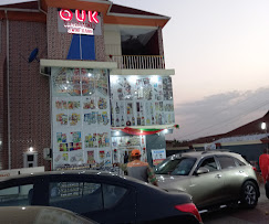 O.U.K storefront at dusk